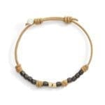 DoDo Bracciale Cordino Sottile con due mini granelli in oro giallo 9k e dieci mini granelli in titanio