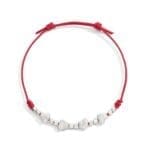 DoDo Bracciale Cordino Sottile con quattro cuori in argento diamantato e dieci mini granelli in argento